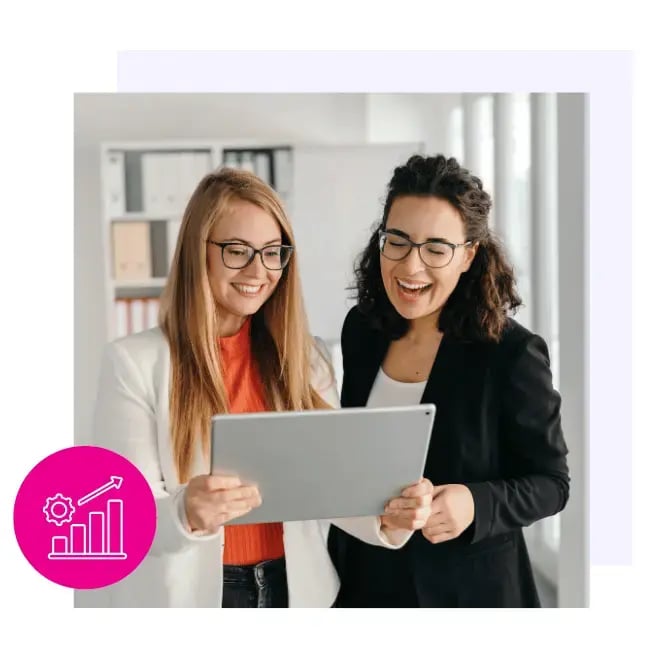 Female colleagues looking at tablet